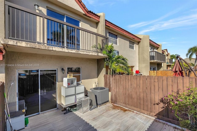 wooden terrace featuring central AC