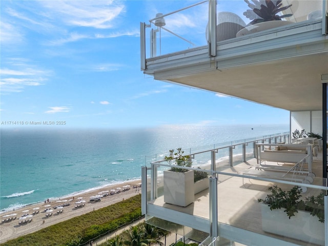 view of water feature with a beach view