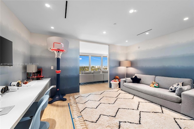 living room with light hardwood / wood-style flooring