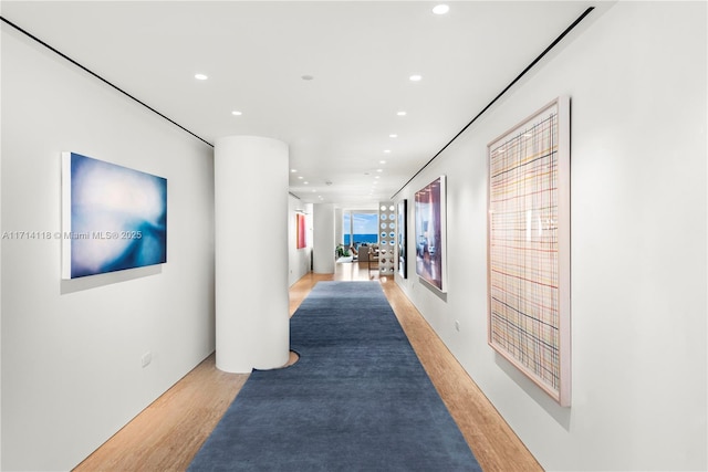 hallway featuring light hardwood / wood-style floors