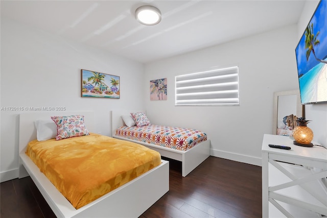 bedroom featuring dark hardwood / wood-style floors