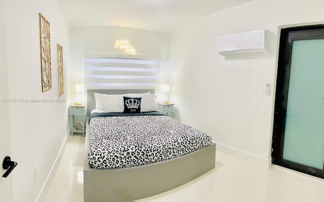 bedroom featuring a wall unit AC