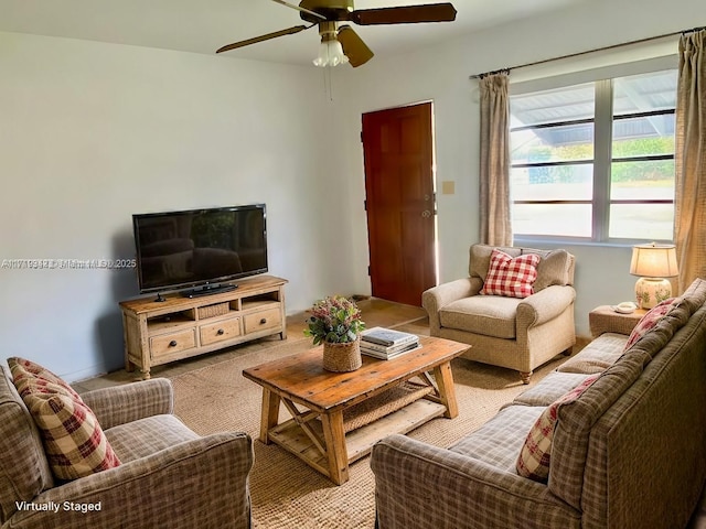 carpeted living room featuring ceiling fan