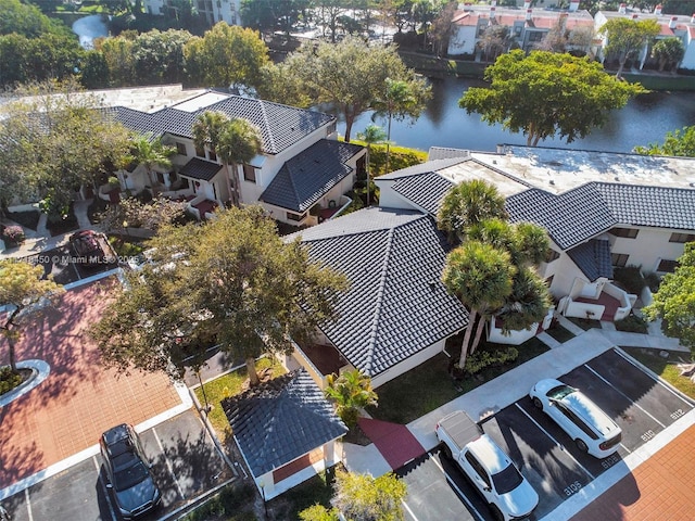 birds eye view of property featuring a water view