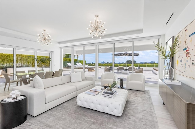 living room with an inviting chandelier