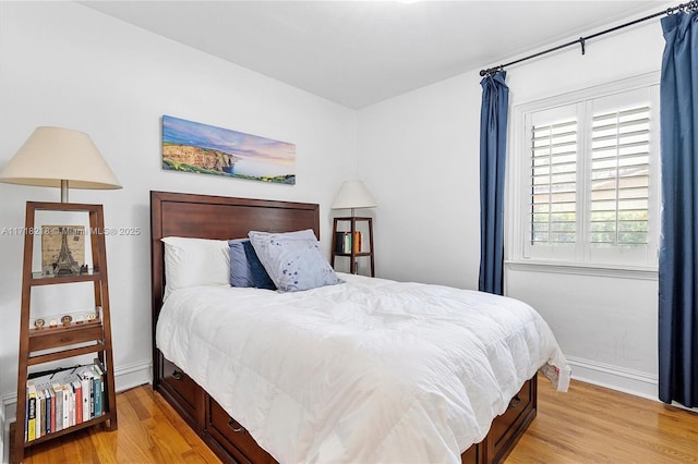 bedroom featuring light wood-type flooring