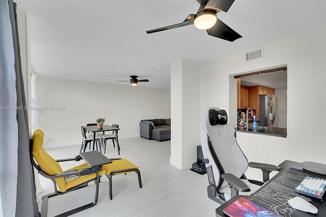 800 Parkview Dr Unit 1001, Hallandale Beach, FL 33009 - office featuring a ceiling fan, light wood-type flooring, and a sink