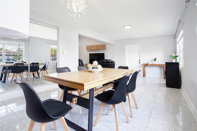 dining room featuring light tile patterned floors