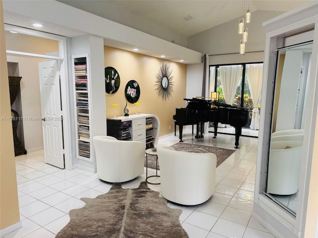 living room featuring lofted ceiling and light tile patterned floors