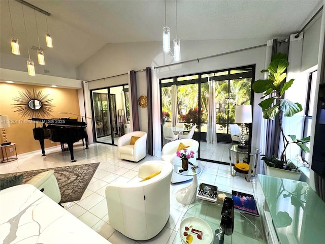 living room with light tile patterned floors, vaulted ceiling, and french doors