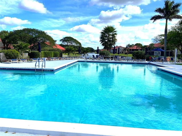 view of pool featuring a patio