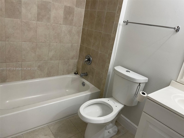 full bathroom featuring tile patterned floors, vanity, tiled shower / bath combo, and toilet