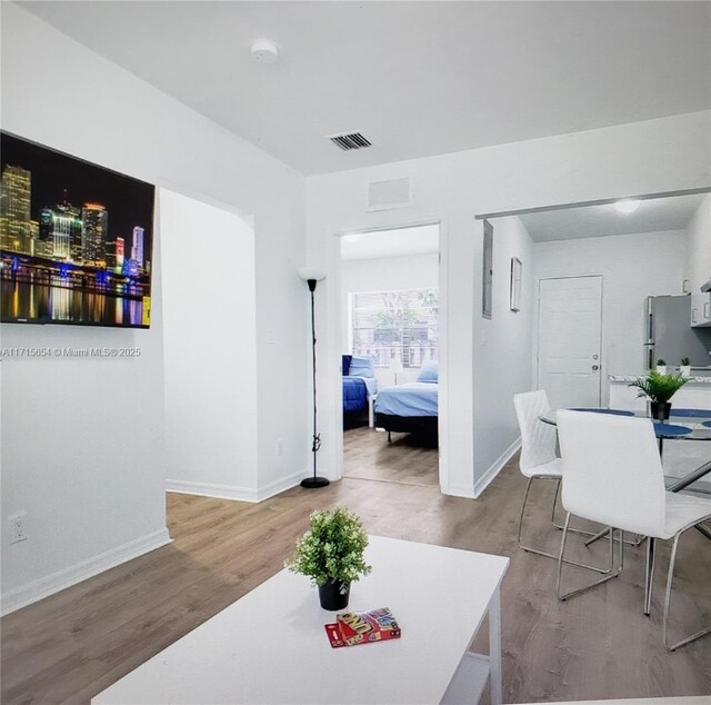 dining room featuring hardwood / wood-style flooring