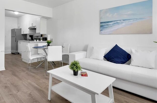 living room featuring light wood-type flooring