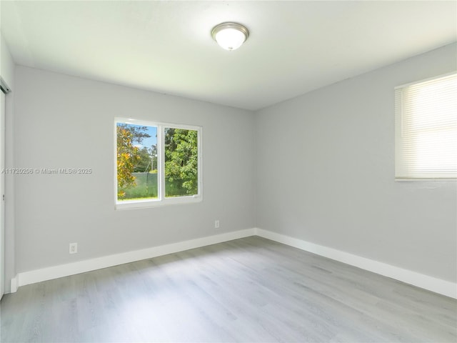 empty room featuring light hardwood / wood-style floors