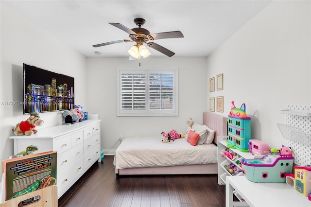 bedroom featuring dark hardwood / wood-style floors and ceiling fan