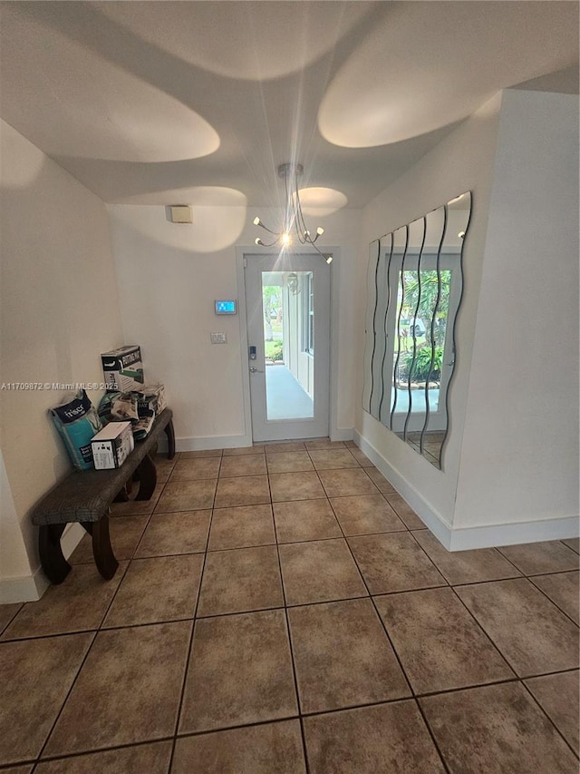 14461 SW 152nd Ct, Miami, FL 33196 - tiled entryway with baseboards
