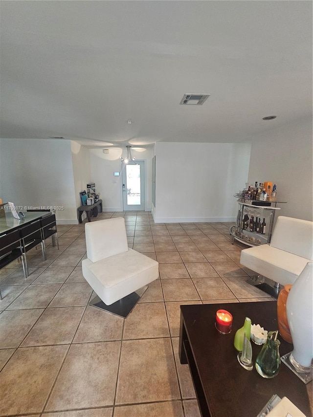 14461 SW 152nd Ct, Miami, FL 33196 - living area featuring light tile patterned flooring, baseboards, and visible vents