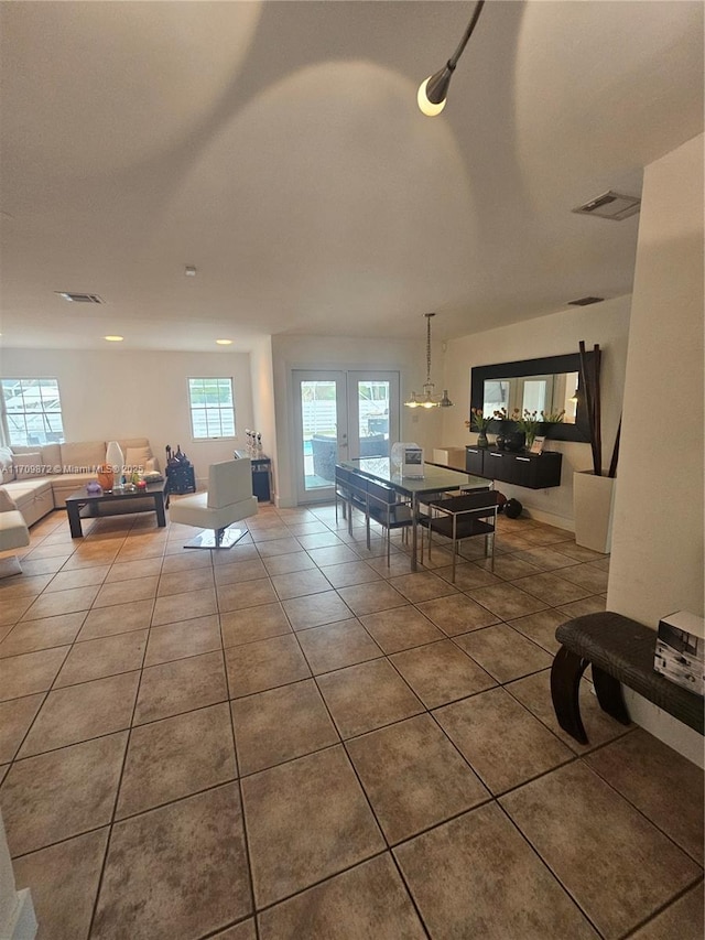 14461 SW 152nd Ct, Miami, FL 33196 - dining room with french doors, tile patterned flooring, and visible vents