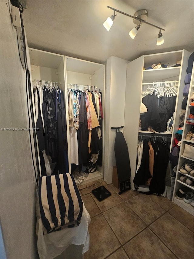 14461 SW 152nd Ct, Miami, FL 33196 - walk in closet with tile patterned flooring