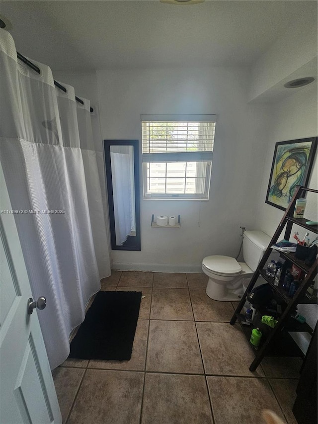 14461 SW 152nd Ct, Miami, FL 33196 - bathroom featuring toilet, tile patterned floors, and a shower with curtain