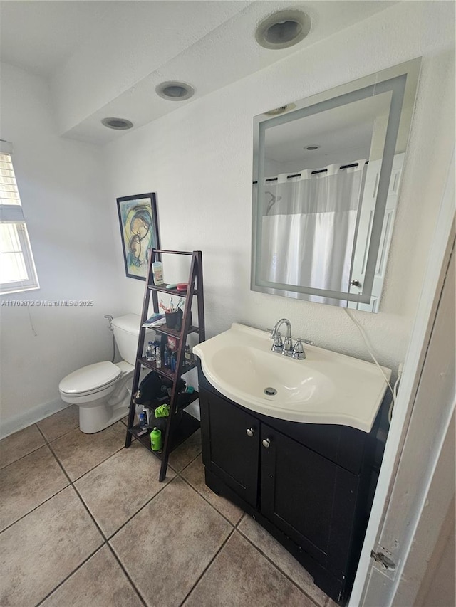 14461 SW 152nd Ct, Miami, FL 33196 - full bath with baseboards, toilet, vanity, a shower with curtain, and tile patterned flooring