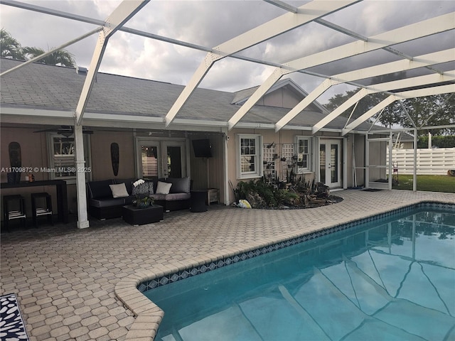 14461 SW 152nd Ct, Miami, FL 33196 - pool with french doors, an outdoor hangout area, a lanai, and a patio area