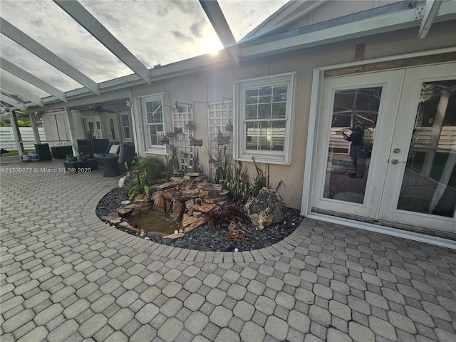 14461 SW 152nd Ct, Miami, FL 33196 - view of patio / terrace featuring glass enclosure, french doors, and a ceiling fan