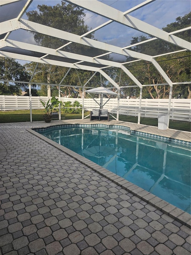 14461 SW 152nd Ct, Miami, FL 33196 - view of swimming pool featuring a patio area, a lanai, fence, and a fenced in pool