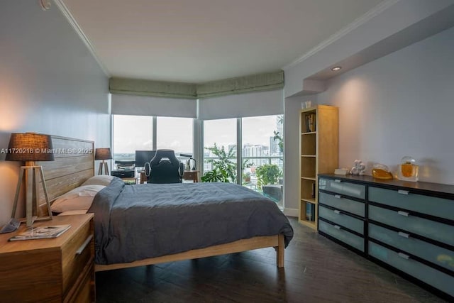 bedroom featuring dark hardwood / wood-style flooring and crown molding