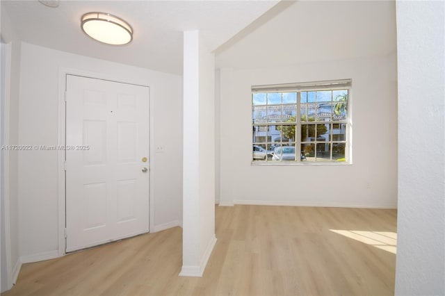 foyer with light hardwood / wood-style floors