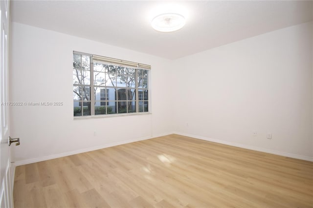 empty room with light wood-type flooring