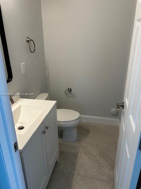 301 NW 28th Ave, Fort Lauderdale, FL 33311 - half bathroom featuring vanity and toilet