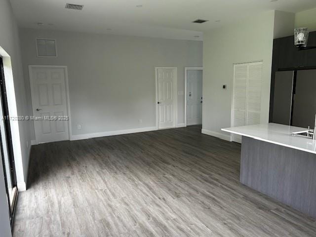 301 NW 28th Ave, Fort Lauderdale, FL 33311 - unfurnished room with wood finished floors and baseboards