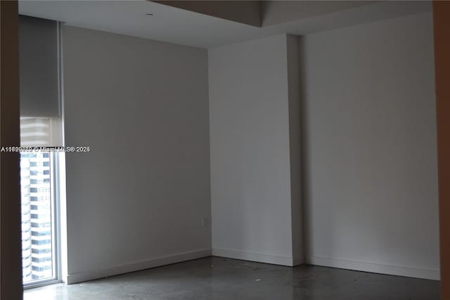 empty room featuring concrete floors