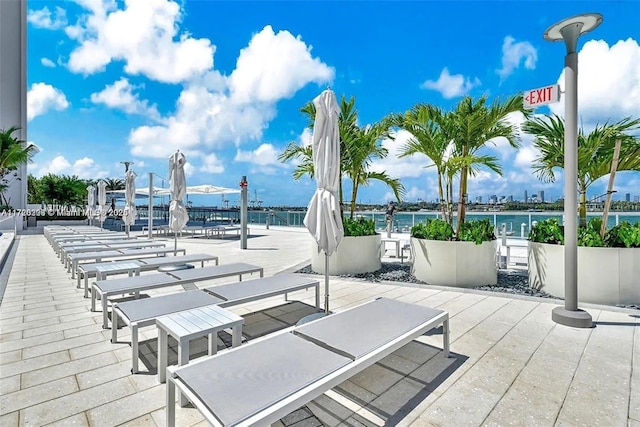 view of patio / terrace featuring a water view