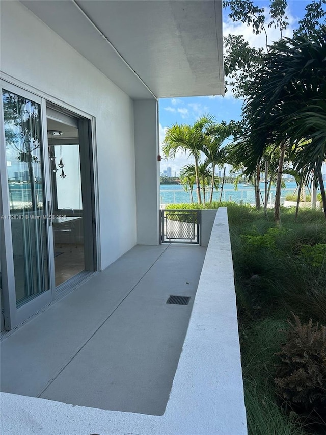 view of patio featuring a water view