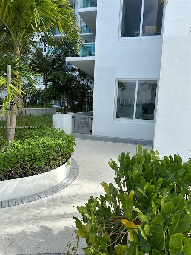 doorway to property with a patio