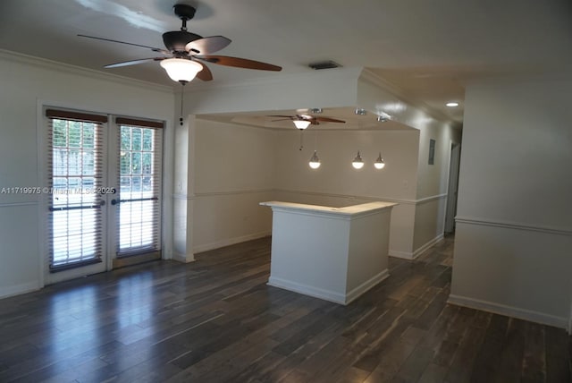 kitchen featuring ceiling fan, dark hardwood / wood-style floors, ornamental molding, and french doors