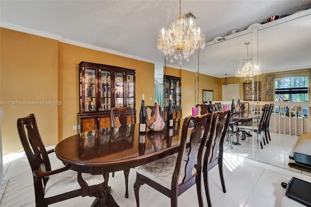 tiled dining space featuring a notable chandelier, crown molding, and a textured ceiling