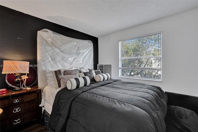 bedroom featuring a textured ceiling