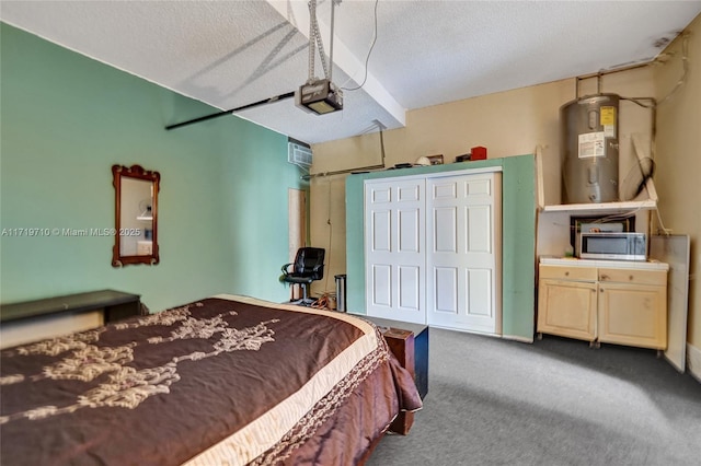 bedroom with carpet, a textured ceiling, electric water heater, a wall mounted AC, and a closet