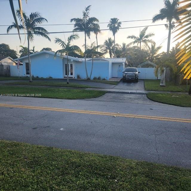 view of front of house with a lawn