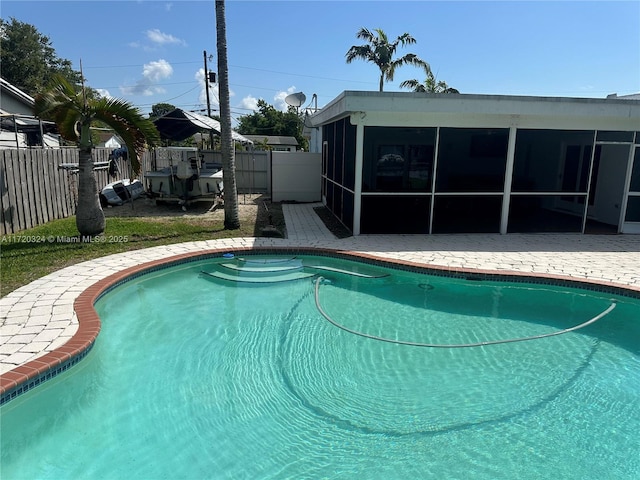 9920 SW 194th St, Cutler Bay, FL 33157 - view of pool with a sunroom