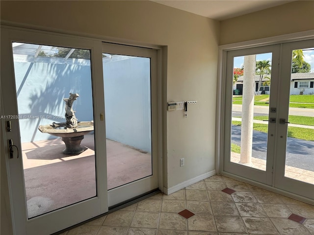 9920 SW 194th St, Cutler Bay, FL 33157 - doorway to outside with french doors and baseboards