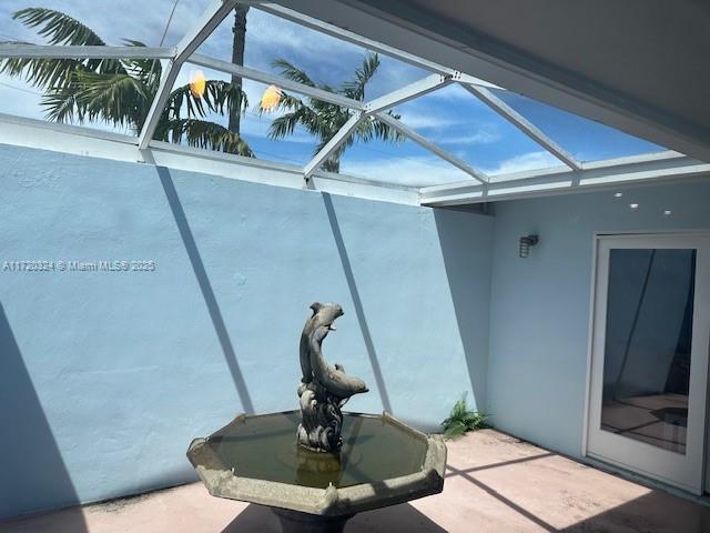 9920 SW 194th St, Cutler Bay, FL 33157 - view of patio / terrace featuring a lanai