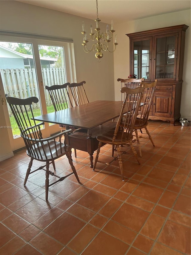 9920 SW 194th St, Cutler Bay, FL 33157 - tiled dining area featuring plenty of natural light and a chandelier