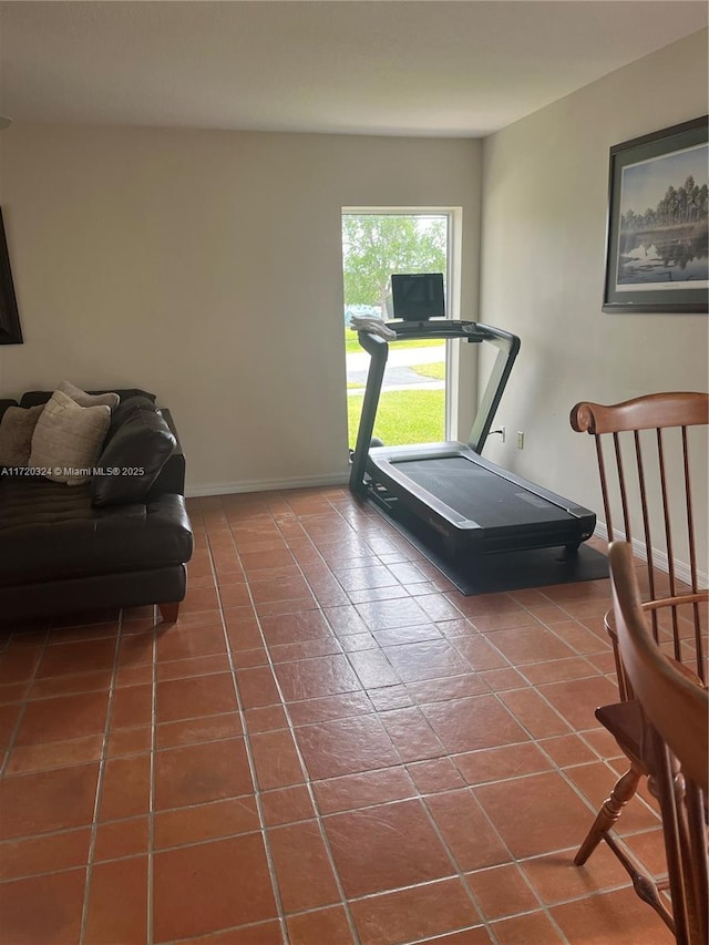 9920 SW 194th St, Cutler Bay, FL 33157 - workout room featuring baseboards and tile patterned floors