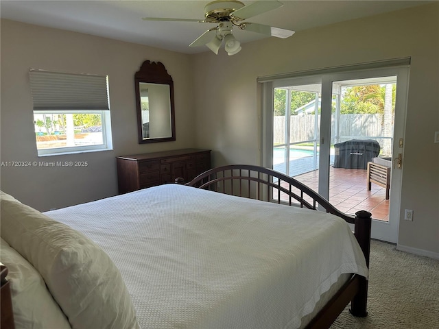 9920 SW 194th St, Cutler Bay, FL 33157 - bedroom with access to exterior, carpet, a ceiling fan, and baseboards