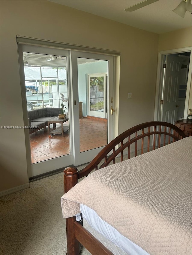 9920 SW 194th St, Cutler Bay, FL 33157 - bedroom featuring access to exterior, carpet flooring, and baseboards
